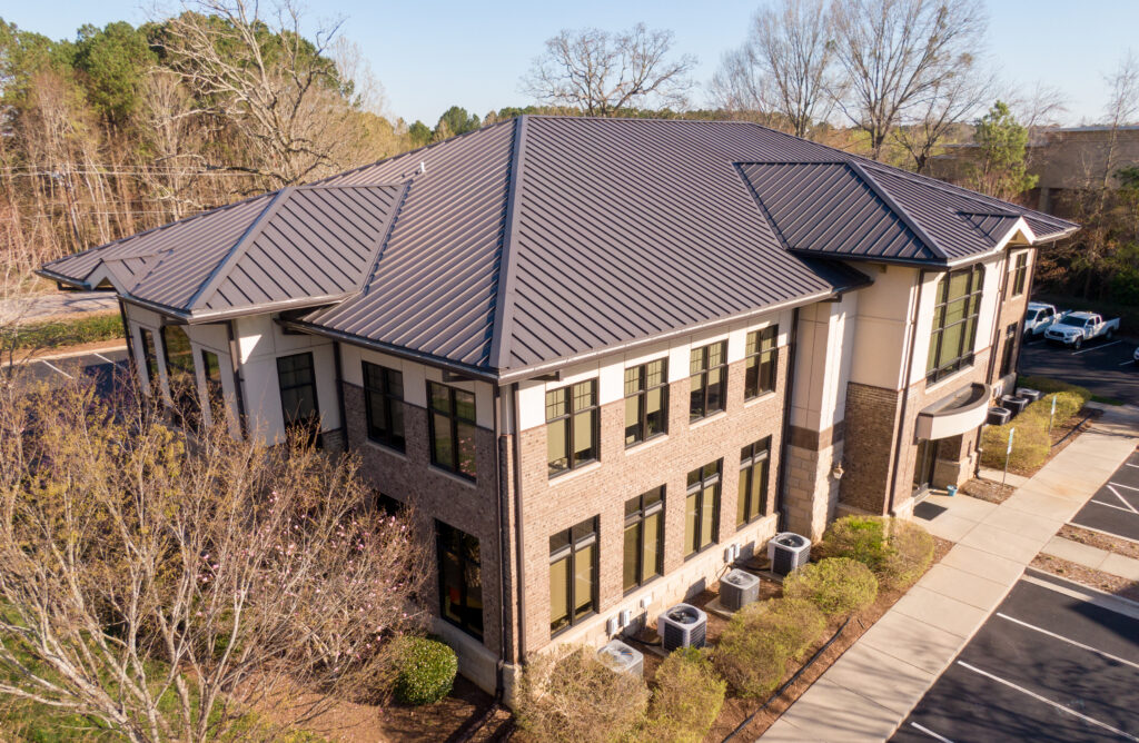 Commercial two-story office building with metal roof gutters in Nashville